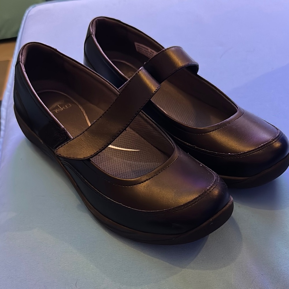 Dansko Black Flats for Everyday Elegance